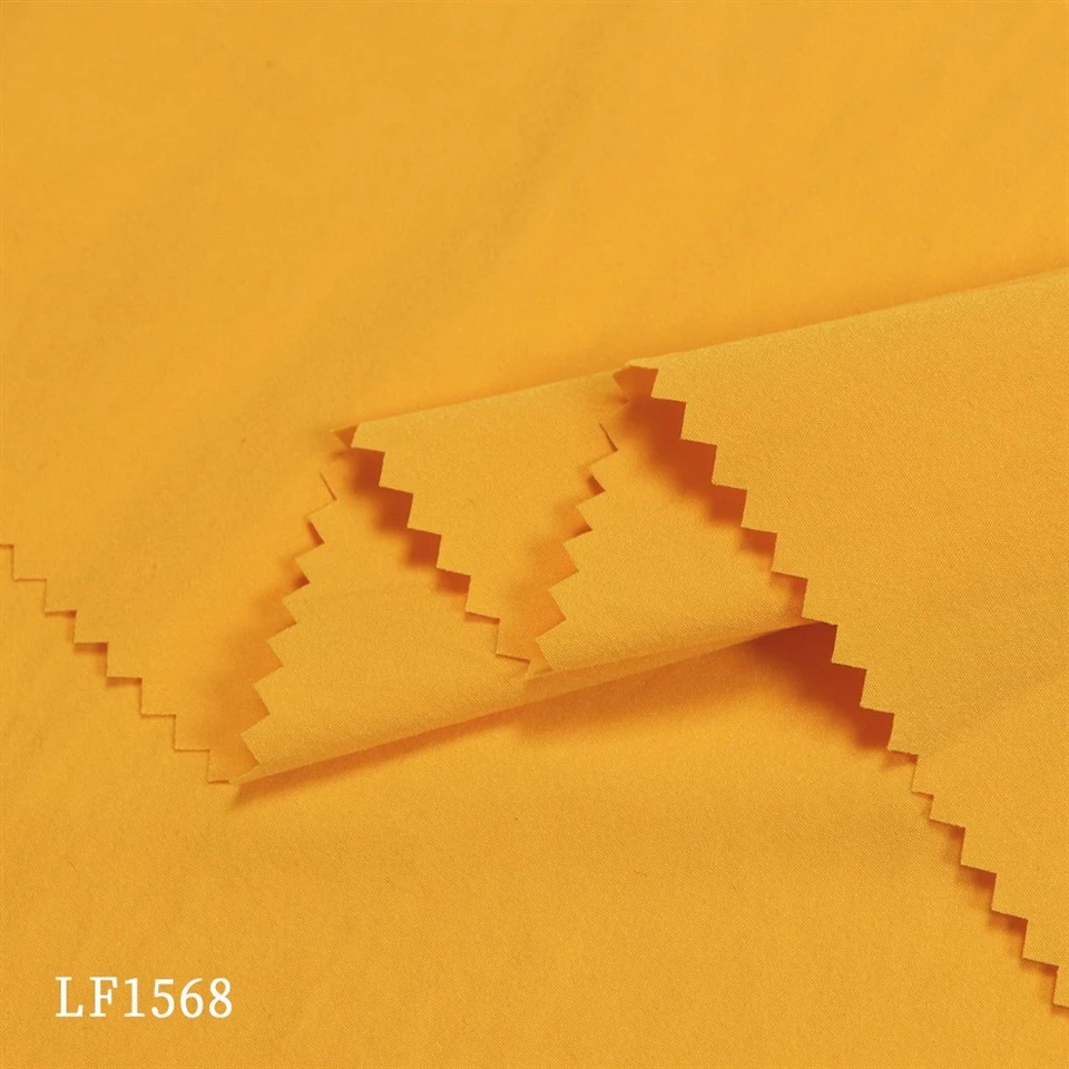 Is toil le Tencel agus Cupro-Stretch Fabric Plain